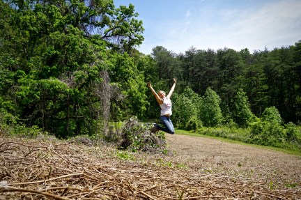 jumping for joy in kudzu field