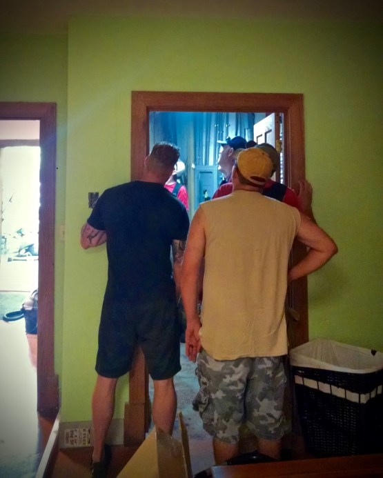 First Responders crowd around the water heater