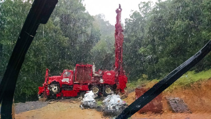 drill rig in the rain through the windshield