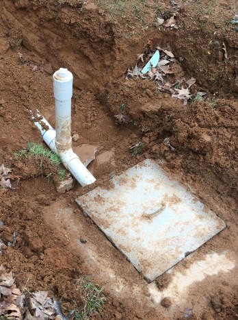 recently excavated septic tank intake