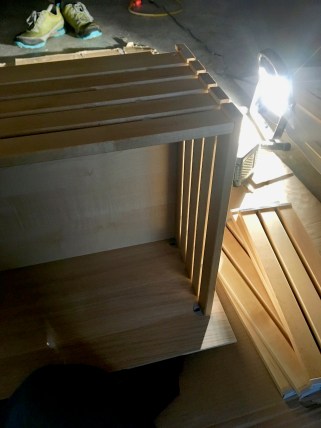 IKEA drawer being built by flashlight