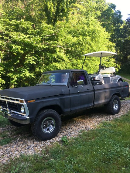 1977 f150 with Club Car golf cart in bed