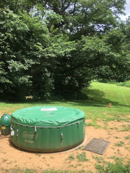 inflatable coleman saluspa in a field