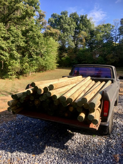 classic F-150 with a load of fence posts