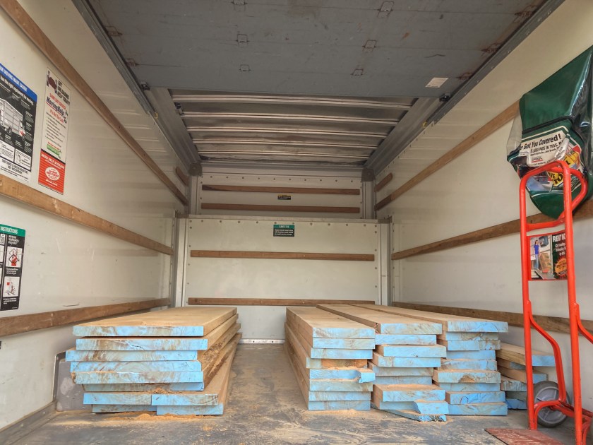 milled red oak boards in a box truck